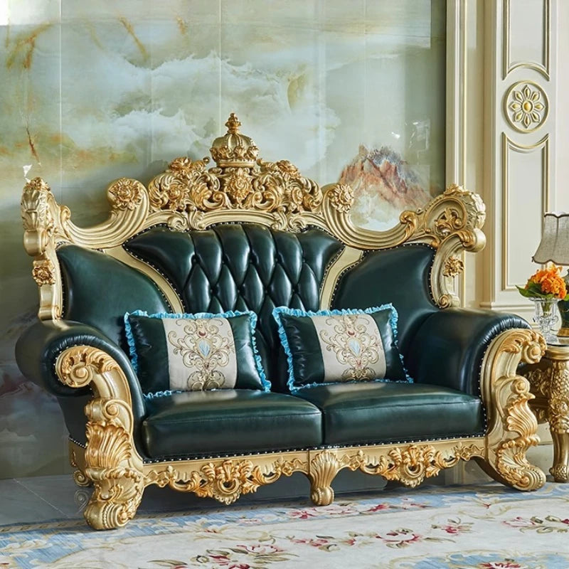 canapé places fauteuil cuir vert foncé ornements dorés baroque moderne coussins décoratifs