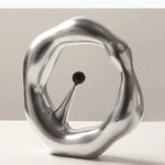 sculpture abstraite contemporaine blanc gris minimaliste texture mat forme organique noire central