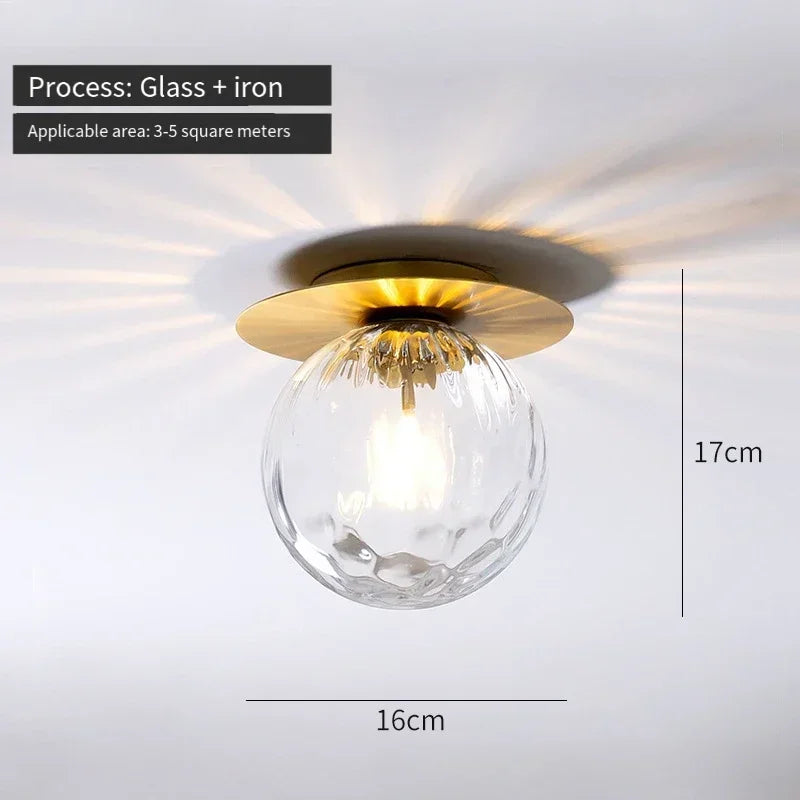 lampe moderne verre transparent noir doré élégante sphérique éclairage contemporain