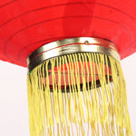 lanterne traditionnelle rouge dorée motifs chinois franges anneaux métalliques nouvelle année chinois decoration festive