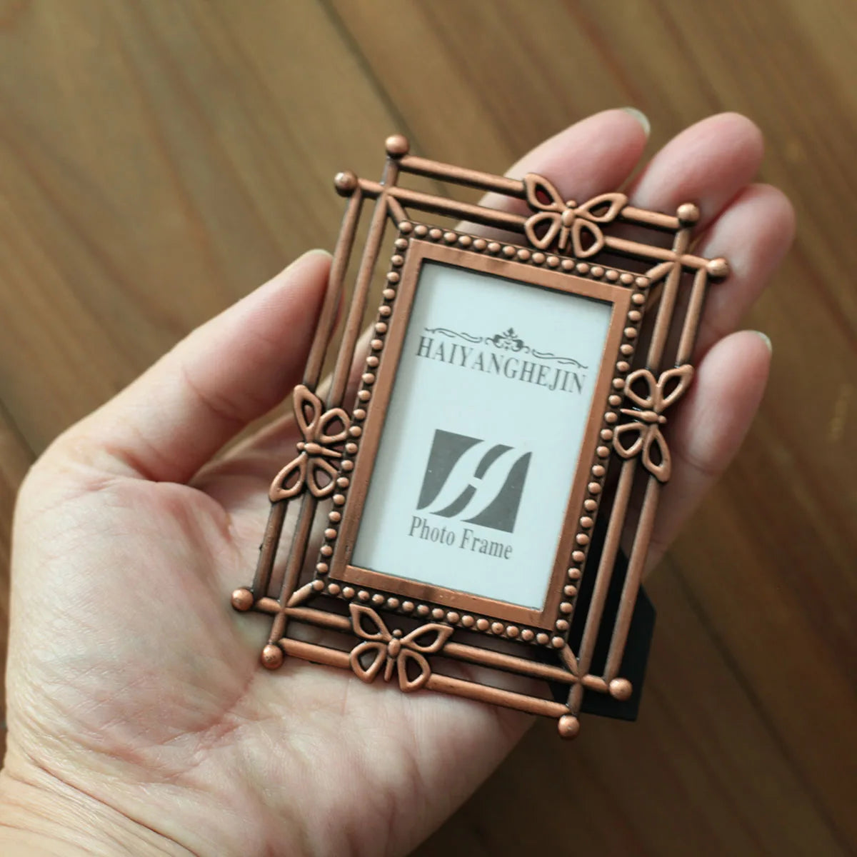 cadre photo pied bronze argenté vintage décor floral complexe métal ornementé