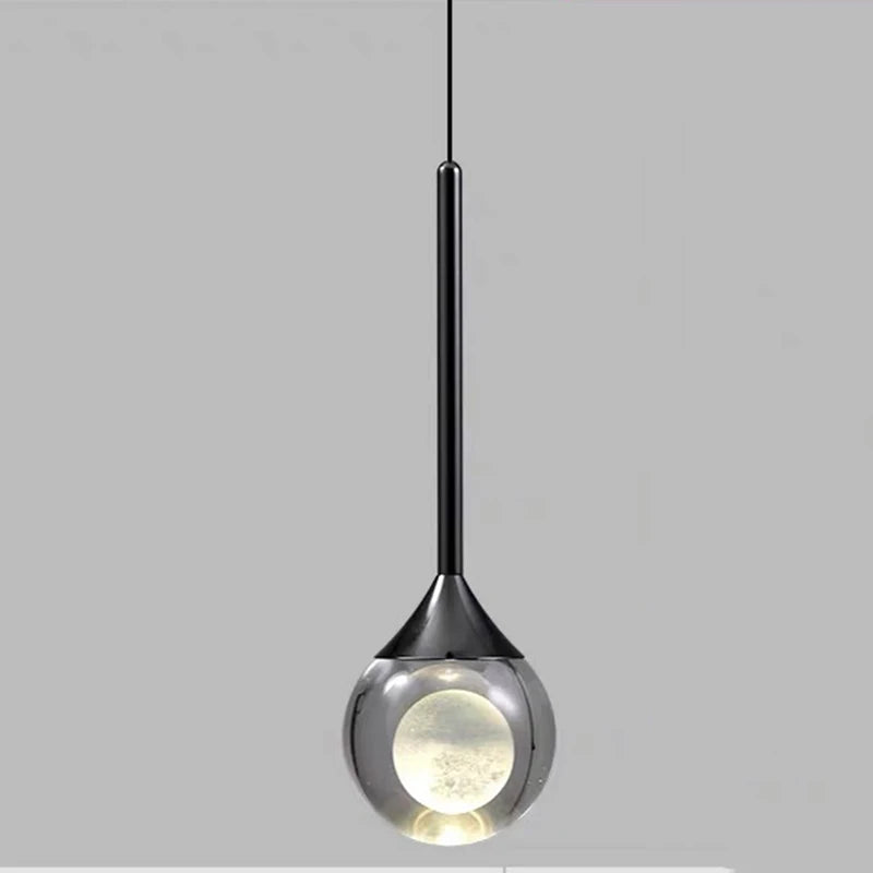 suspension lumineuse moderne noir argenté transparent serviettes peignoirs osier decoration interieur minimaliste
