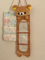 sac rangement mural peluche ours marron clair mignon crochets métalliques poignées cuir compartments plastique