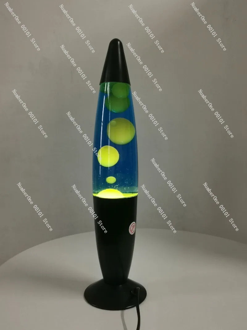 lampe lava bleu vert noir liquide formes flottantes transparent rétro psychédélique