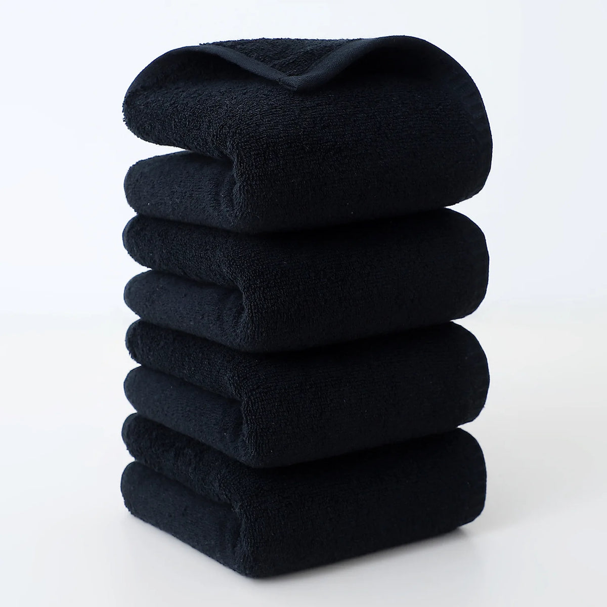 serviettes coton douces absorbantes blanc gris noir velours modernes minimalistes crochets support mural