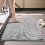 tapis bain moderne beige bleu clair gris antidérapant texture bouclée absorbant sol