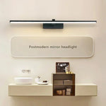 Applique murale LED blanche fixée au mur dans une salle de bain