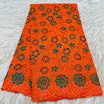 tissu dentelle coton brodé fleurs motif broderie africaine voile suisse vêtement élégant