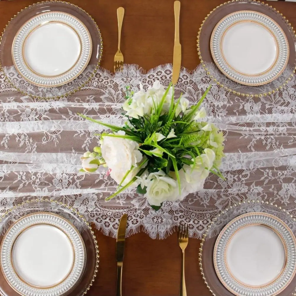 nappe dentelle florale blanc table manger élégante transparente bordures frangées