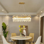 suspension lumineuse moderne dorée cristal chrome poli led télécommande transparente chambre salon