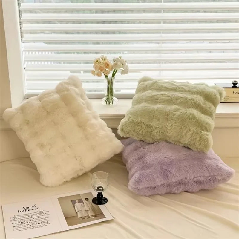 taies d'oreiller fourrure synthétique rose clair blanc cassé moderne respectueux environnement simple vert pastel