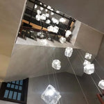 lustre moderne blanc transparent cubes géométriques suspension câbles blancs lumière chaude lumière froide 30w