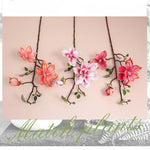 décoration intérieure branche magnolia artificielle fleurs rose blanches naturel salon maison événements