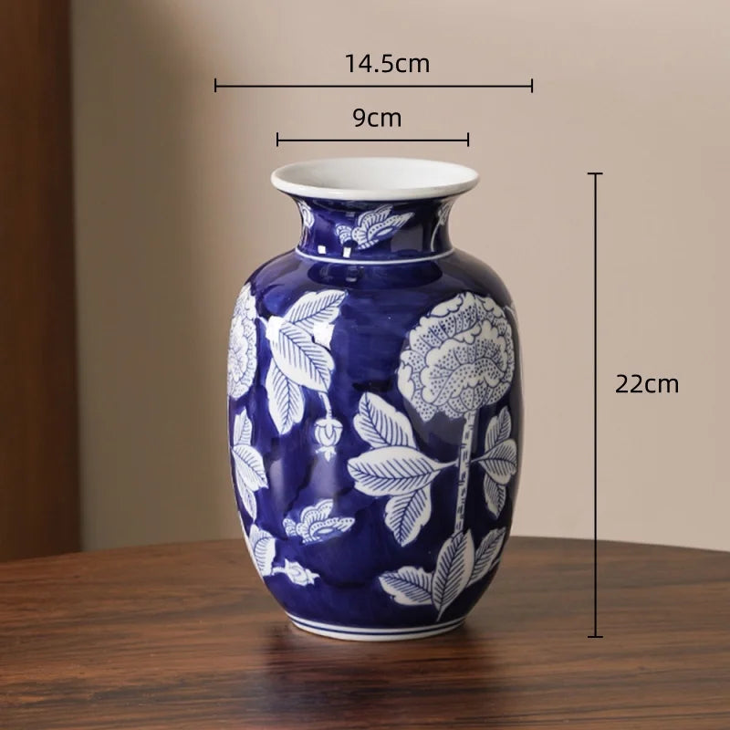 vase porcelaine chinois blanc bleu fleurs feuilles oiseaux géométrique classique floral table decoration