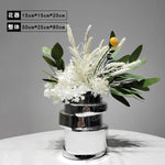 vase moderne argenté brillant fleurs artificielles blanches vertes décoration maison