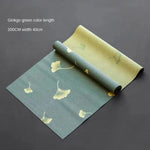 serviette table classique feuilles d'érable dorées vert foncé beige marron traditionnelle tasses thé plateau