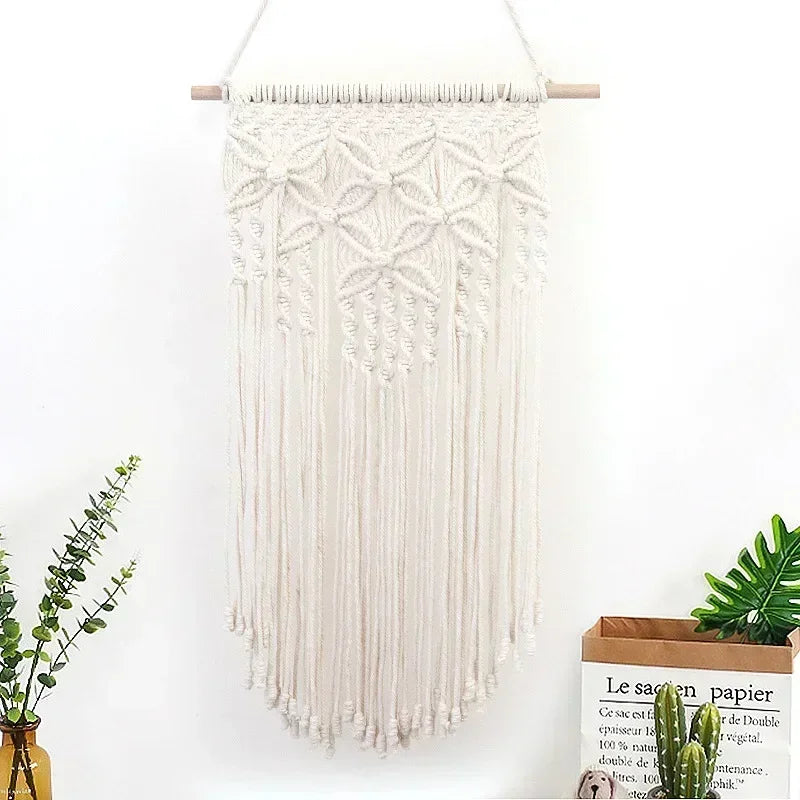 tapisserie macramé boho chic beige motifs géométriques franges moderne suspension maison
