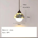 Suspension lumineuse moderne pierre texture granulée blanc marron beige gris câble suspendu chambre salon