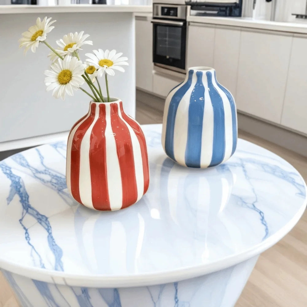 vase porcelaine rose blanc rayures horizontales moderne décoration intérieure arrangement floral maison