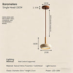 suspension lumineuse moderne pierre beige brun clair texture granuleuse câble suspendu led salon restaurant