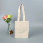 sac main toile réutilisable noir blanc beige classique uni opacité poignées respectueux environnement multifonction