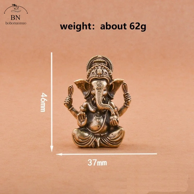 statuette ganesha bronze doré sculptée details complexes religieuse traditionnelle décoration intérieure éléphant dieuhindou ornement