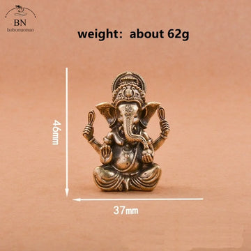 statuette ganesha bronze doré sculptée details complexes religieuse traditionnelle décoration intérieure éléphant dieuhindou ornement