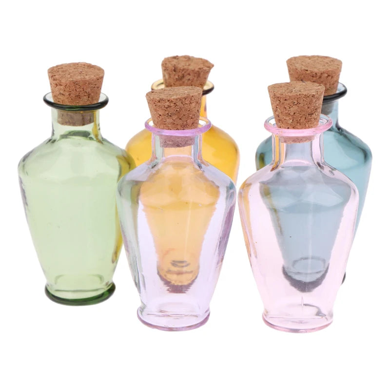 flacons verre transparents bouchons lierres décorations vintage classiques couleurs variées marron blanc bleu rose