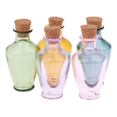 flacons verre transparents bouchons lierres décorations vintage classiques couleurs variées marron blanc bleu rose