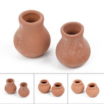 pots terre cuite orange brun texture rustique traditionnel plantes fleurs decoration jardin maison