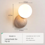 lampe murale moderne pierre gris clair beige texture granulée éclairage chambre entrée étude interrupteur