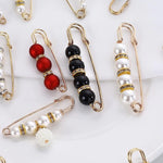 broches ornementales strass classiques élégantes clips or noires rouges