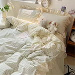 Ensemble complet 4 pièces montrant housse, drap et taies d'oreiller