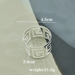 anneaux serviettes métal or argent motif géométrique moderne élégants fixations pression coton 12 pièces