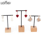 présentoir bijoux barre velours métal inoxydable boucles d'oreilles clips strass moderne élégant argent bleu