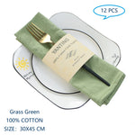 Serviettes de table en coton vert herbe, parfaites pour la décoration de table.