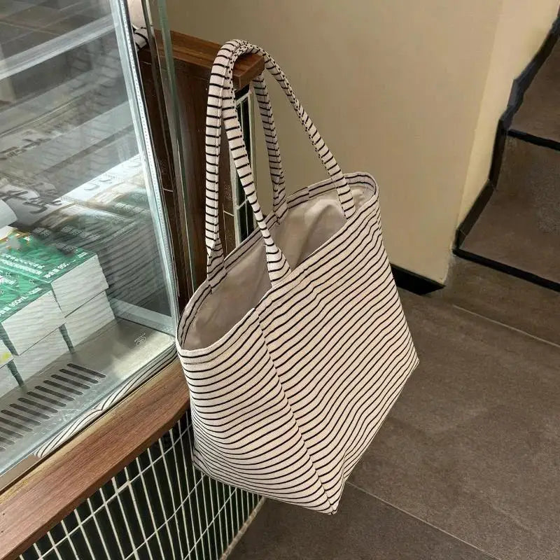 sac main blanc noir rayures horizontales poignées détachables intérieur beige casual