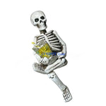 figurines squelette résine boissons halloween blanc rouge jaune aspect osseux texture rugueuse