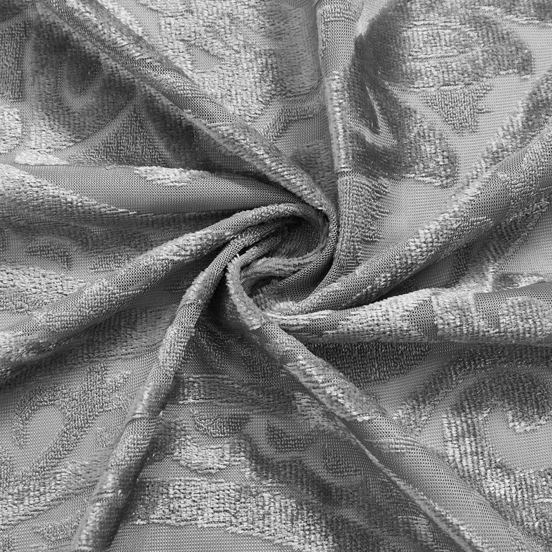 Tissu gris avec motifs élégants et texture raffinée, idéal pour la décoration intérieure et la confection de rideaux ou de housses modernes.