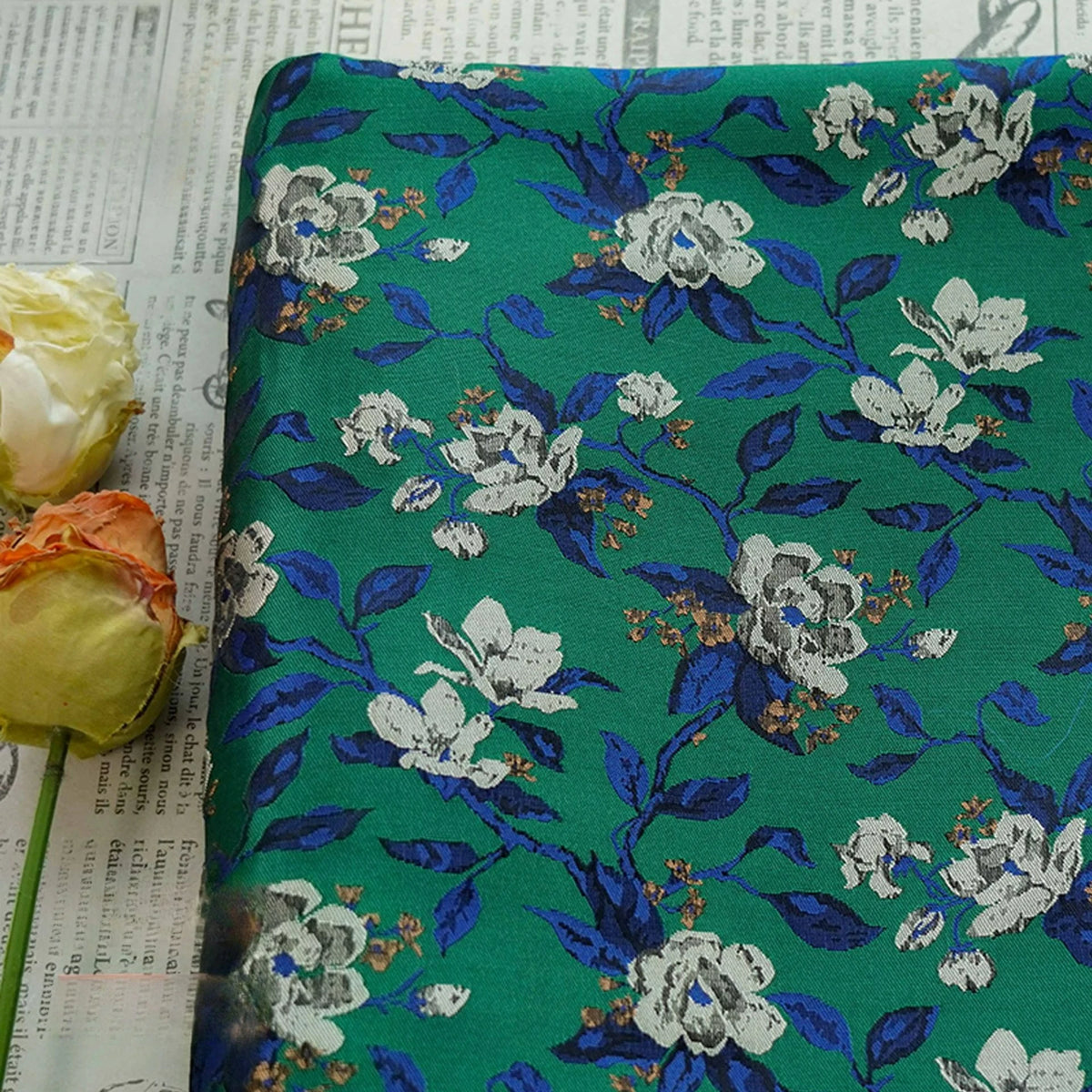 tissu imprimé fleurs blanches vert polyester classique résistance intempéries opacité tissu brocart Jacquard