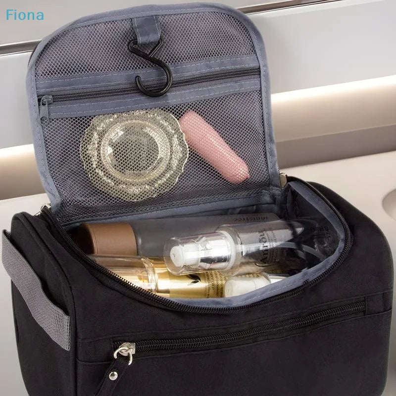 sac toilette pliable tissu texturé noir suspension crochet brosses dents rasoir crème solaire flacons