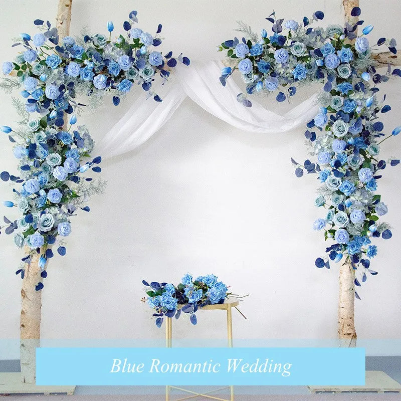 Arche décoration romantique fleurs artificielles feuilles vertes tissu blanc translucide extérieur mariage anniversaire