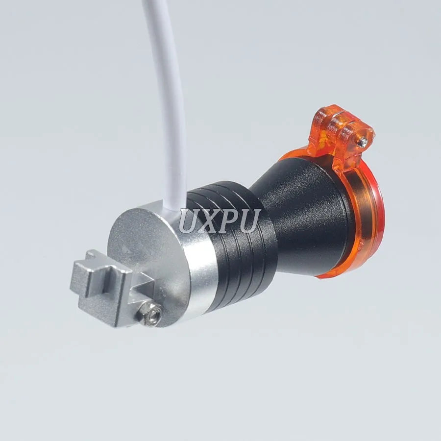 lampe frontale led argent noir moderne tête texturée lentille transparente orange fixée câble boîte
