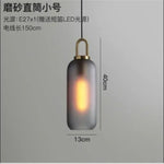 suspension lumineuse moderne gris fumé doré verre mat métal poli ampoule filament visible chambre