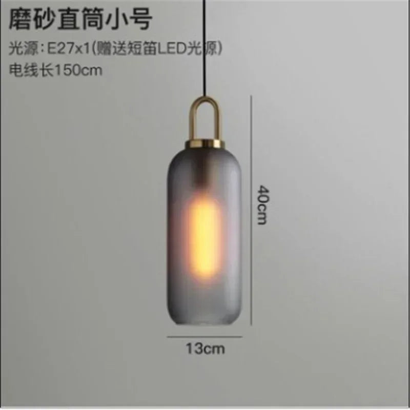 suspension lumineuse moderne gris fumé doré verre mat métal poli ampoule filament visible chambre