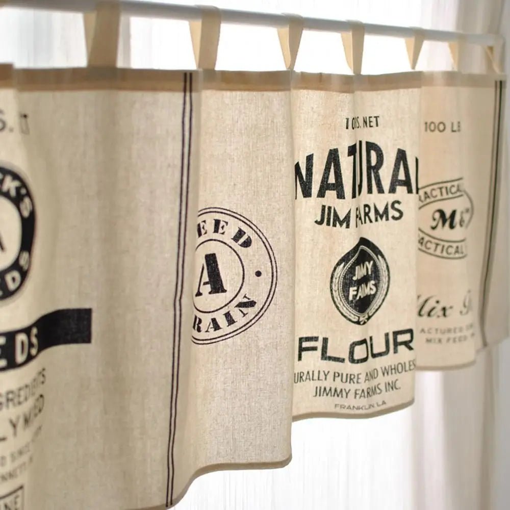 rideau vintage graphique étiquettes anciennes tissu granuleux crème noir suspension tringle métallique