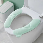siège toilette amovible vert pastel antidérapant moderne adhésif poignée intégrée lavable réutilisable chambre