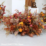 décoration événement mariage arc floral composition feuilles branches rustique automnale