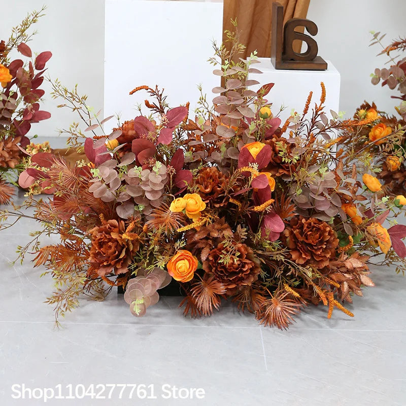 décoration événement mariage arc floral composition feuilles branches rustique automnale