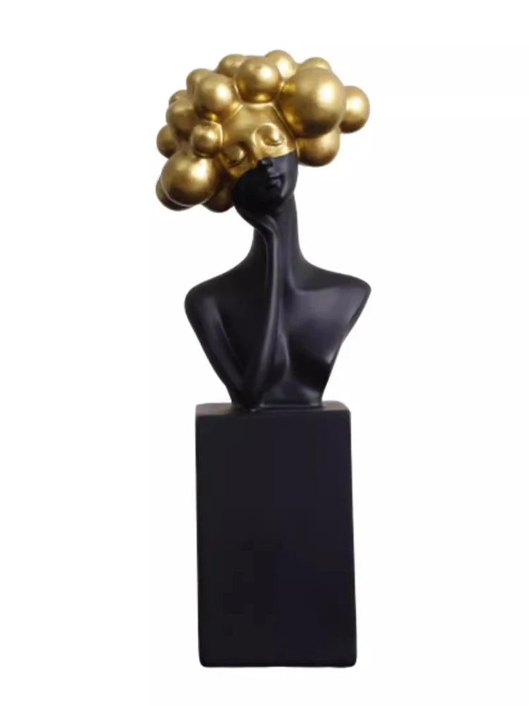 statuette décorative buste féminin noir blanc bleu or moderne minimaliste.surface lisse polie.formes arrondies socle